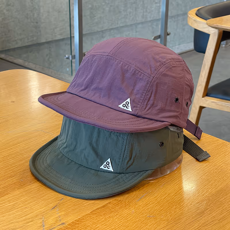 Man wearing a vintage inspired Japanese baseball cap in a stylish streetwear setting